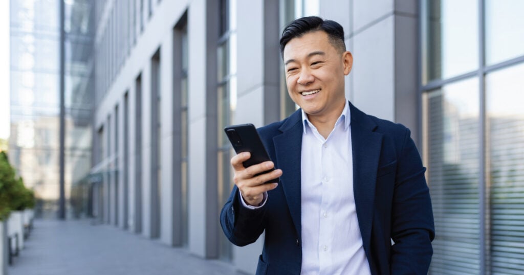 business man walking out of office