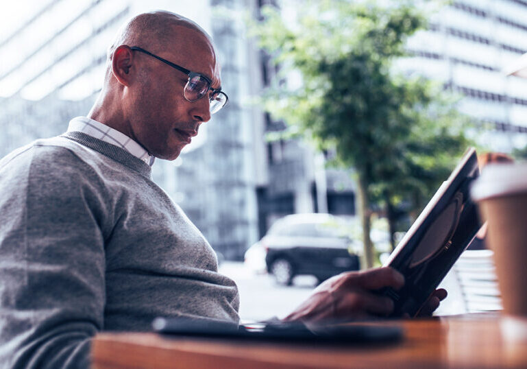 Businessman sitting at a café.