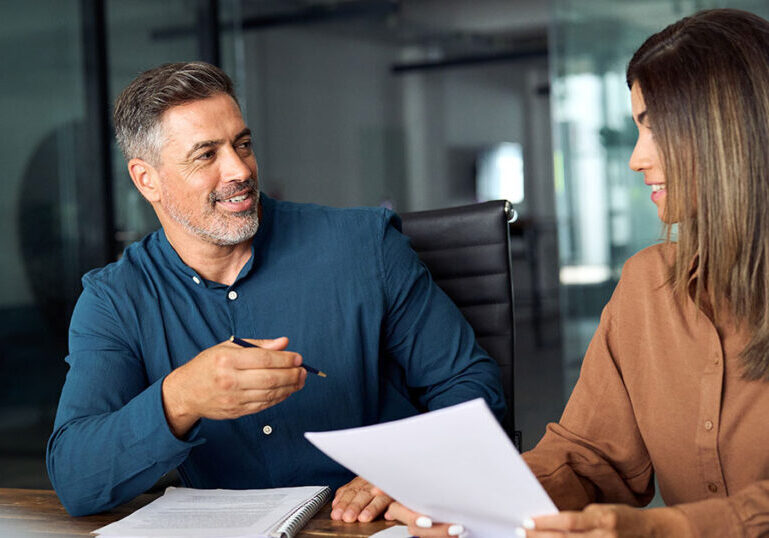 Man and woman reviewing financial plan