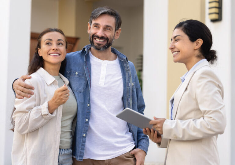Younger couple with realtor