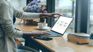 woman checking credit history on laptop