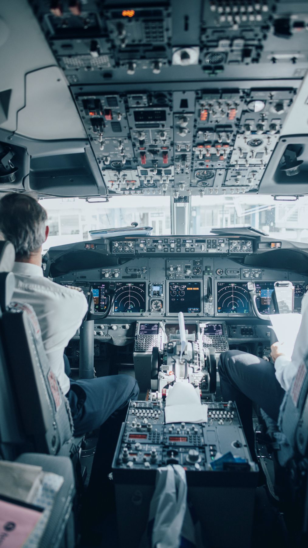 Airline pilot inside cockpit