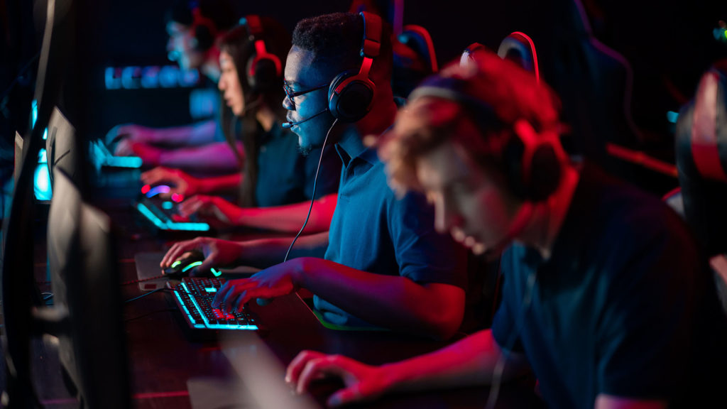 A team of esports athletes conducts a training session before an online tournament