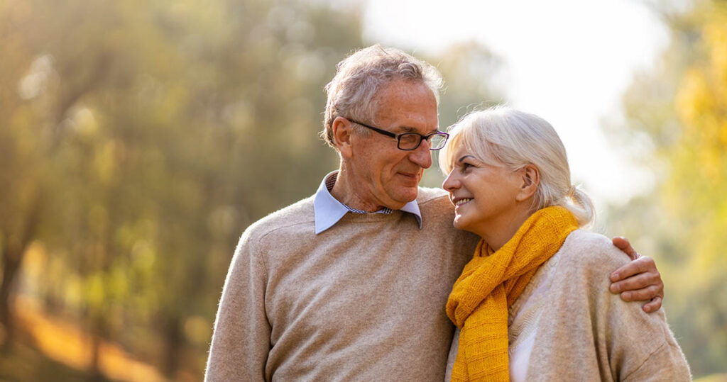Happy senior couple discusses their plans for income in retirement