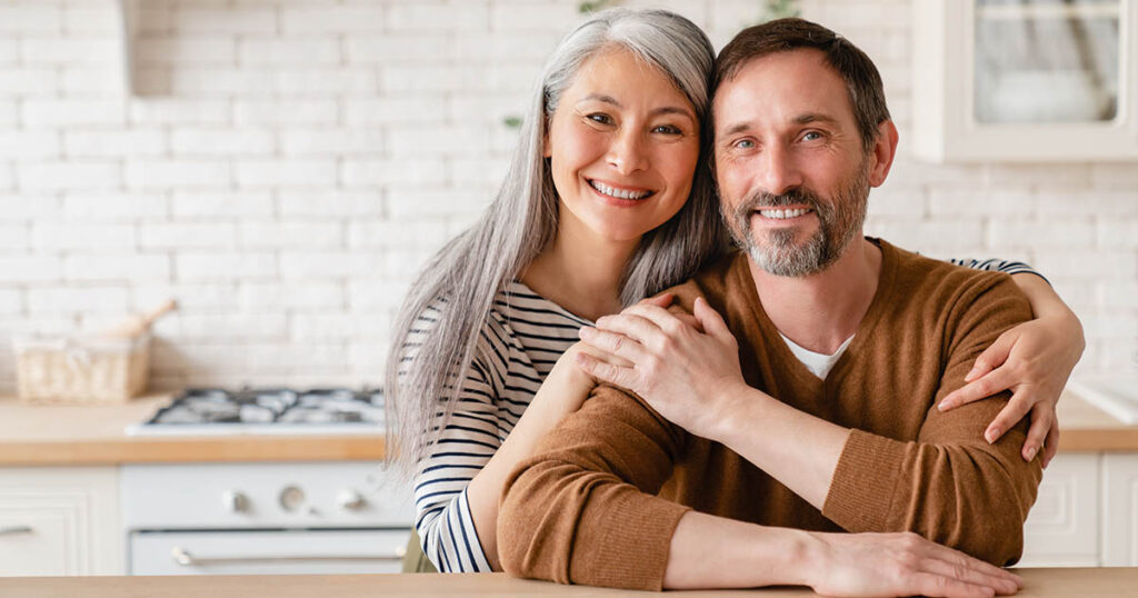 Happy couple employs asset protection strategies despite not being wealthy