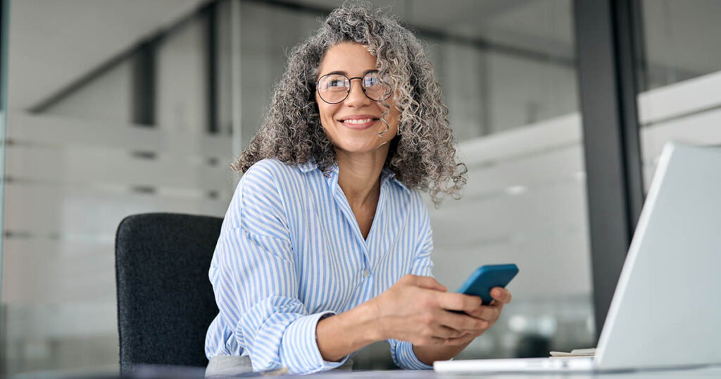 mature business woman contemplates her concentrated stock positions