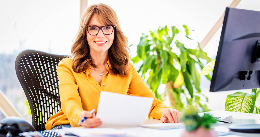 Woman handles financial housekeeping items