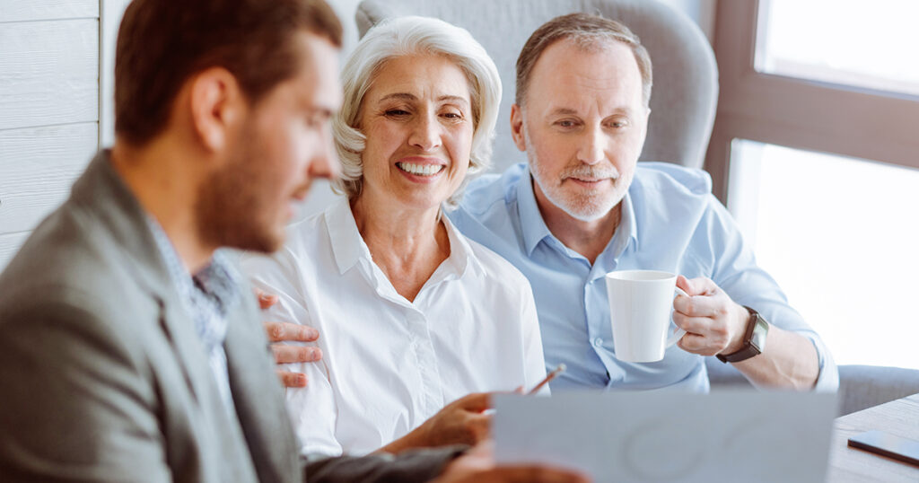 Older couple meeting with advisor