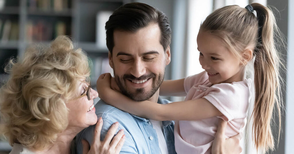 Man cares for his parent and his child as part of sandwich generation