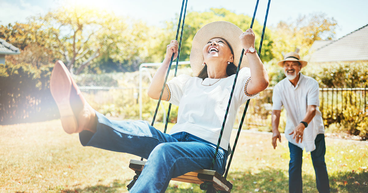 Older couple playing outside