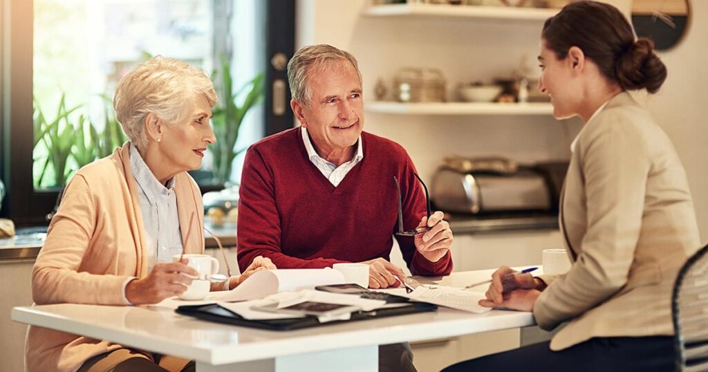 UHNW couple meeting with a family office advisor to discuss coordinated wealth management, family governance and multigenerational planning