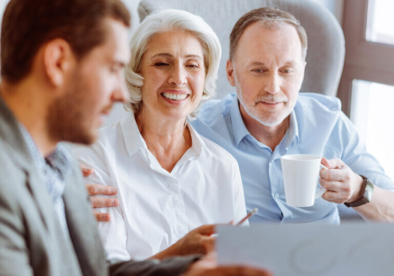 Older couple meeting with advisor