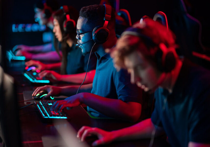 A team of esports athletes conducts a training session before an online tournament