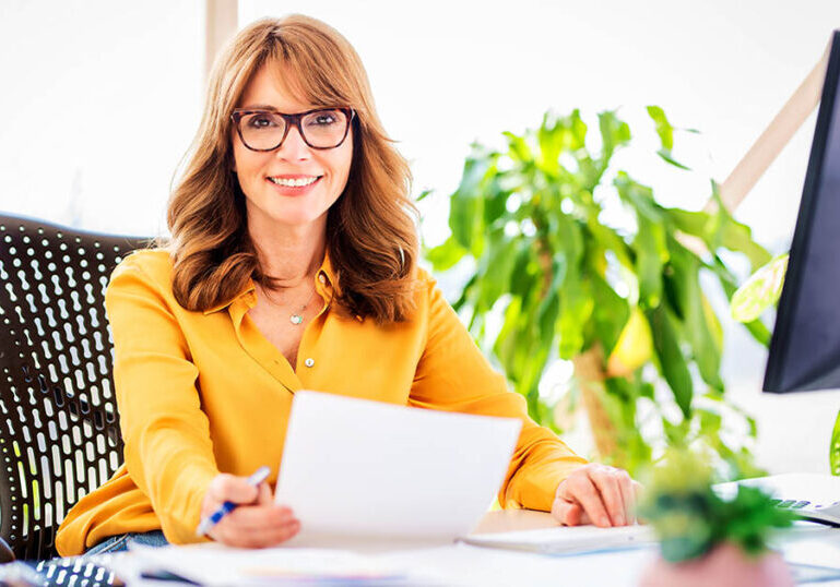 Woman handles financial housekeeping items