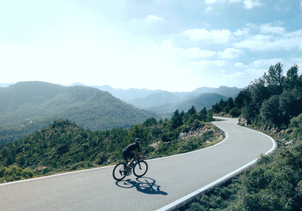 Cyclist on the mountain road