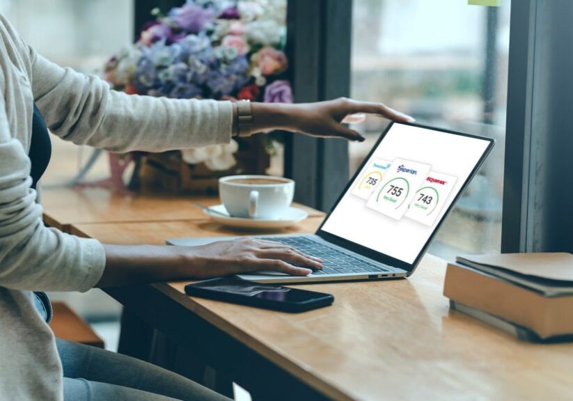 woman checking credit history on laptop